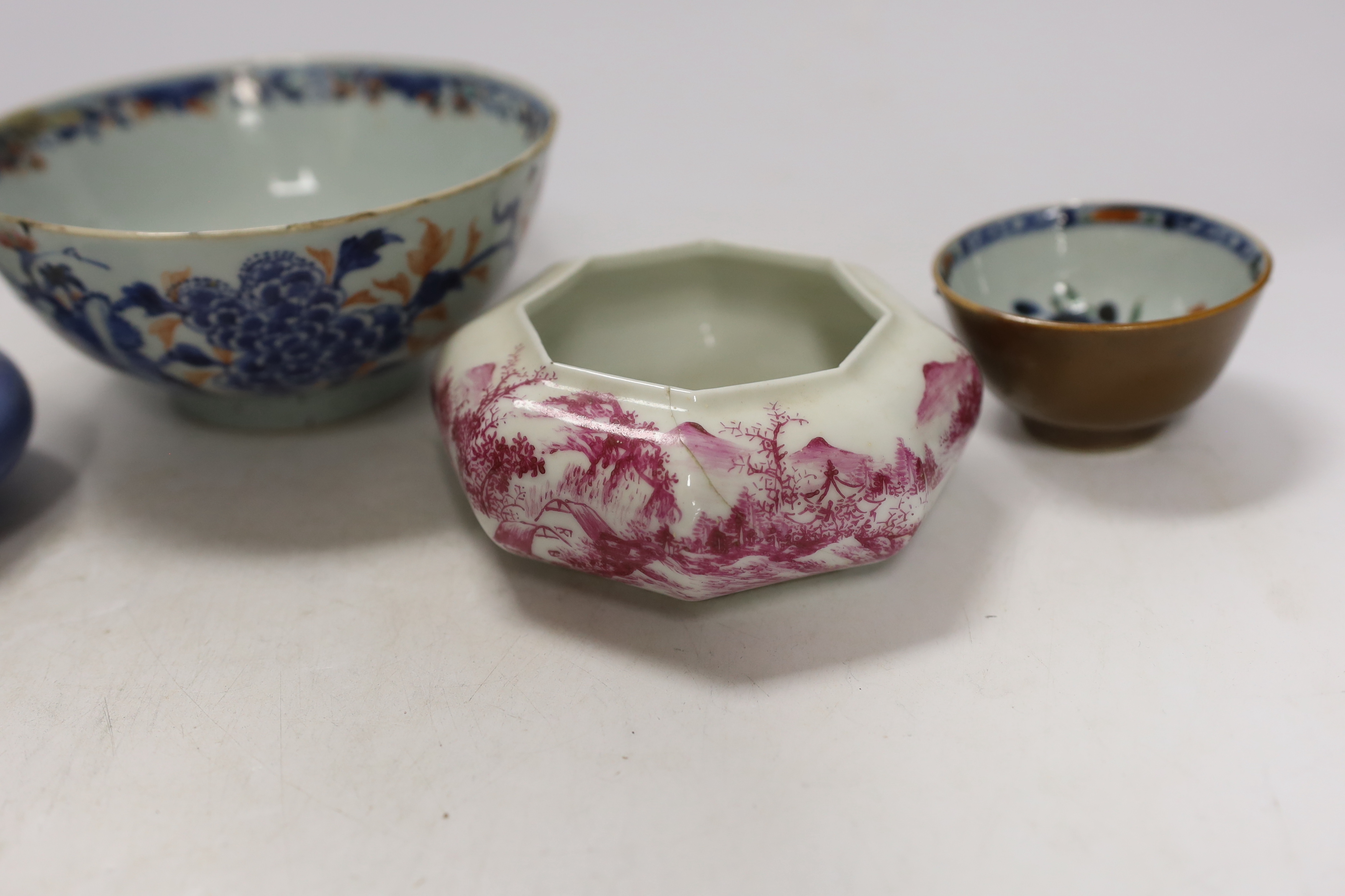 A Chinese Clare de lune glazed brushwasher, a famille rose box and cover, an octagonal puce enamelled brushwasher, an 18th century bowl and teabowl, largest 15cm in diameter (5)